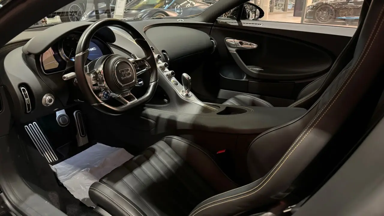 Bugatti Chiron 110 Ani 2019, vue arrière — Super Car Rental Switzerland, Switzerland. Bugatti Chiron 110 Ani in Switzerland La Bugatti Chiron 110 Ani 2019 fait partie des…