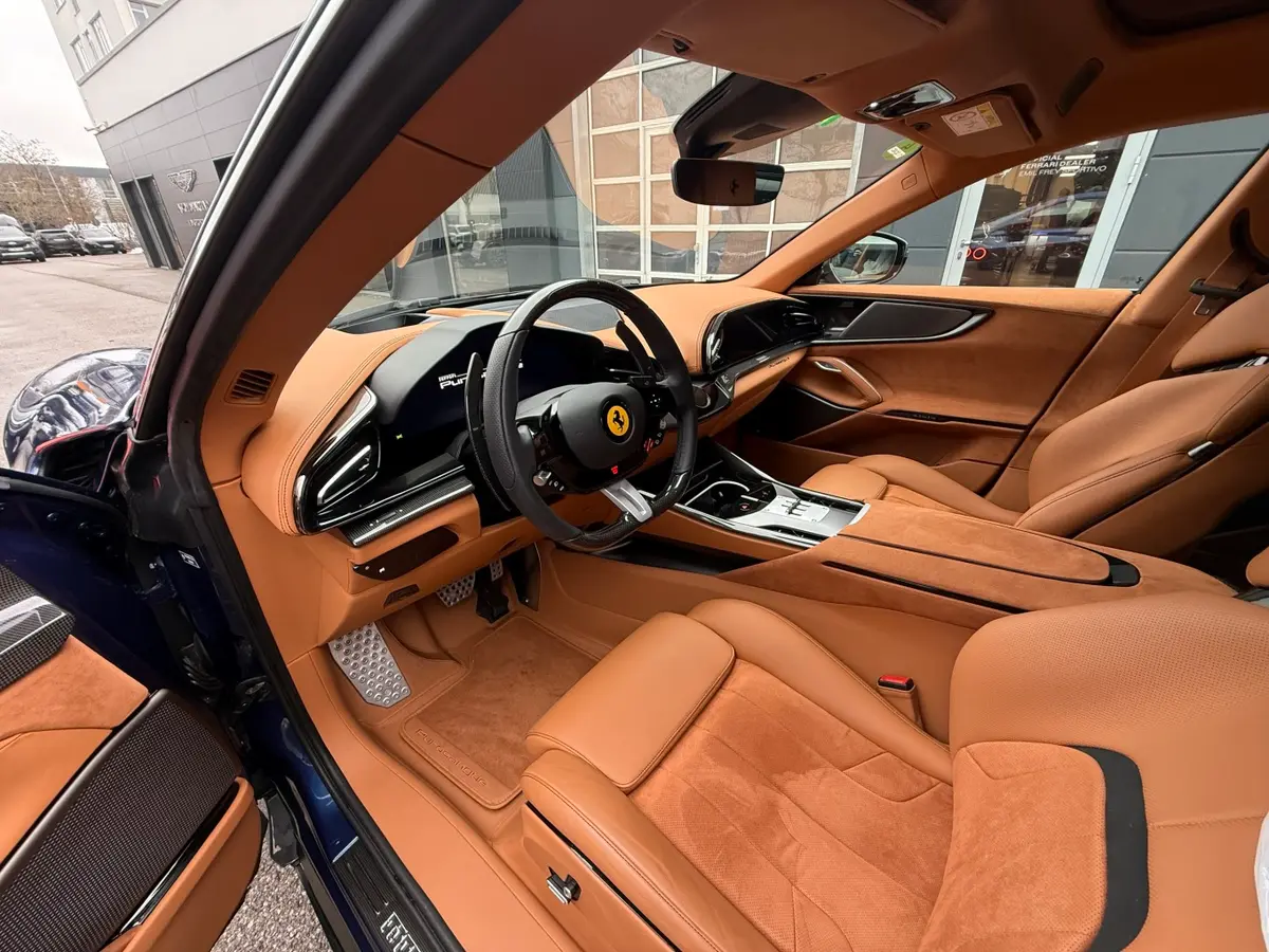 Ferrari Purosangue 2024, vue arrière — Super Car Rental Switzerland, Switzerland. Ferrari Purosangue in Switzerland La Ferrari Purosangue 2024 est proposée à la location…