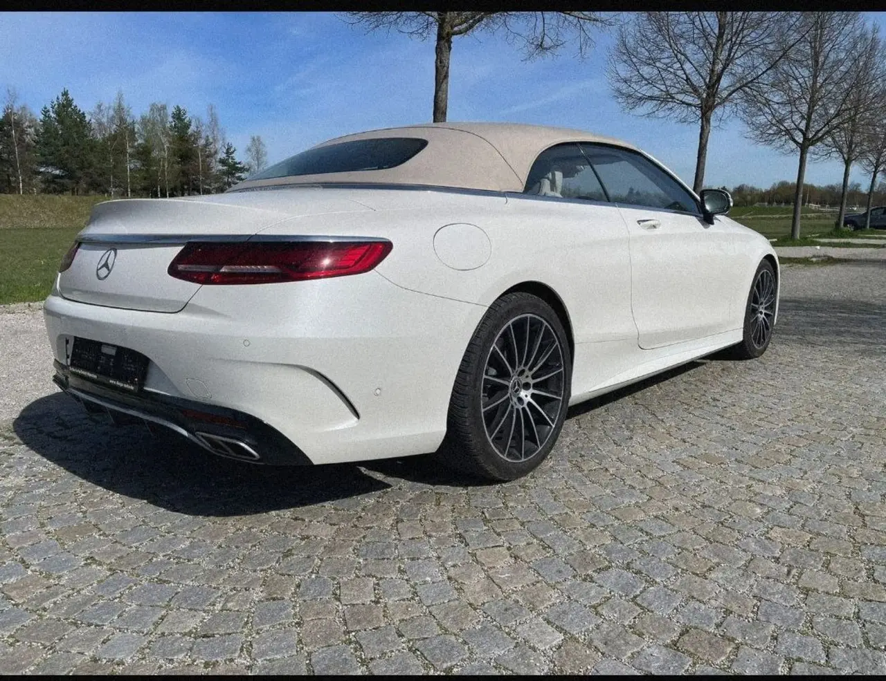 Mercedes Benz S560 Cabrio 2021, rear view — Super Car Rental Switzerland, Switzerland. Mercedes Benz S560 Cabrio in Switzerland The Mercedes Benz S560 Cabrio from 2021 is…
