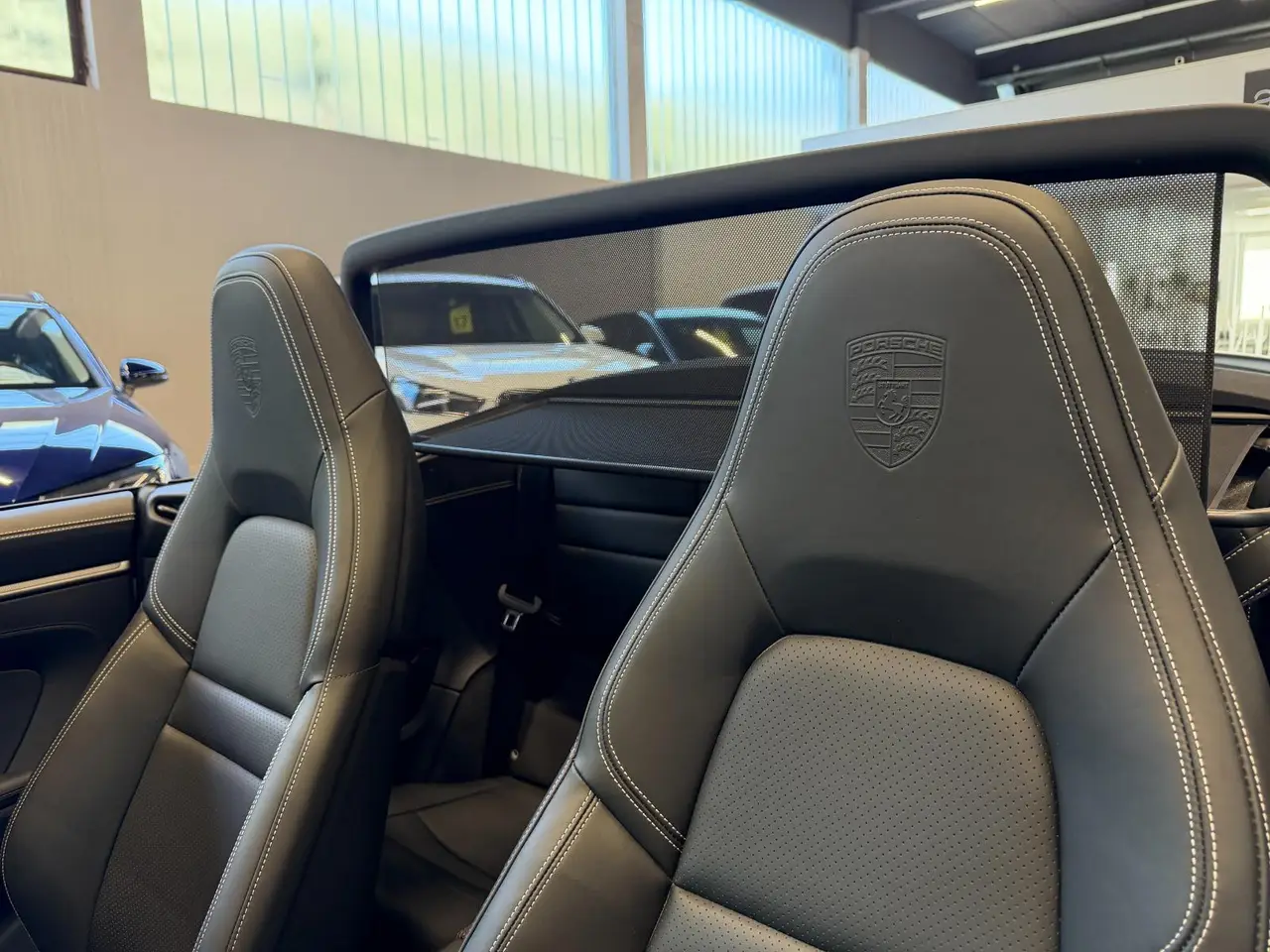 Porsche 911 Carrera S Cabrio (992) 2025, Heckansicht — Super Car Rental Switzerland, Switzerland. Porsche 911 Carrera S Cabrio (992) in Switzerland Das Porsche 911 Carrera S Cabrio (992),…